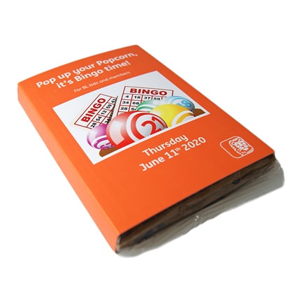 Magnetron popcorn in een bedrukte sleeve als promotiemiddel